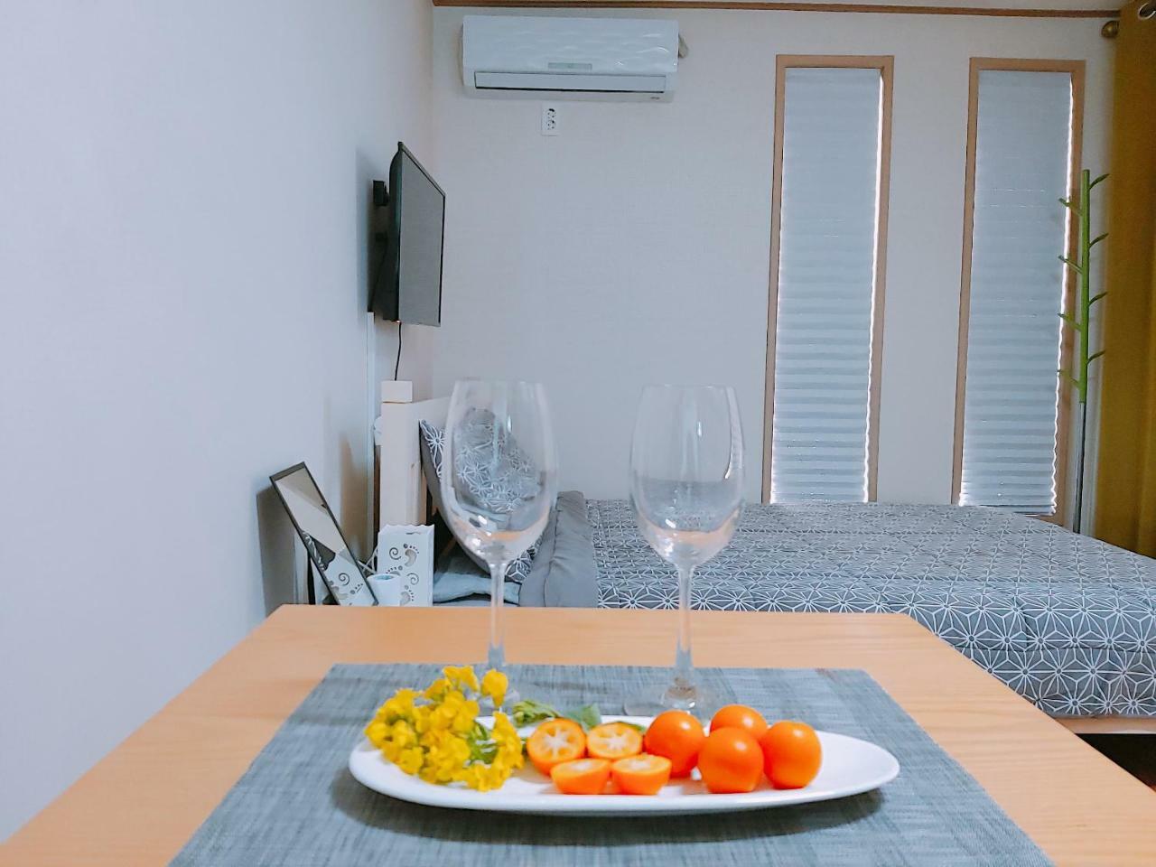 Blue Island Guesthouse Seogwipo Esterno foto